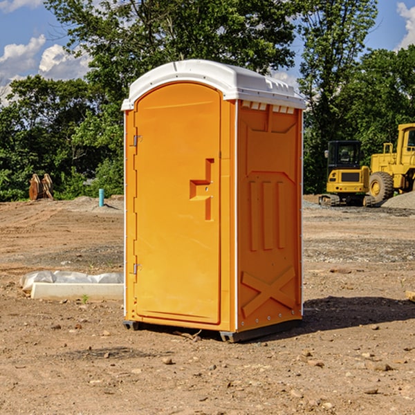 how often are the porta potties cleaned and serviced during a rental period in Surrey